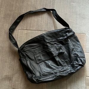 Leather can be used as Computer or a Diaper Bag 16”x13”x5” with 3 spaces inside